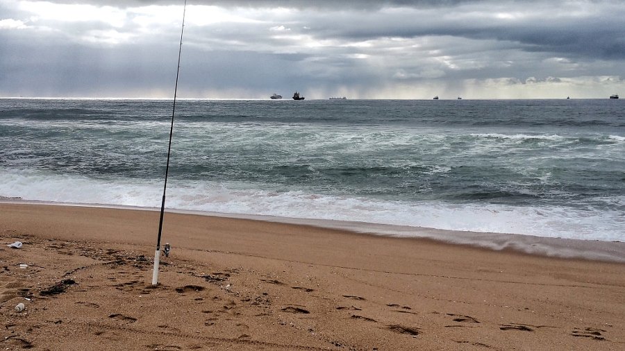Waiting for a bite. Fishing on the beach at Umhlanga Rocks