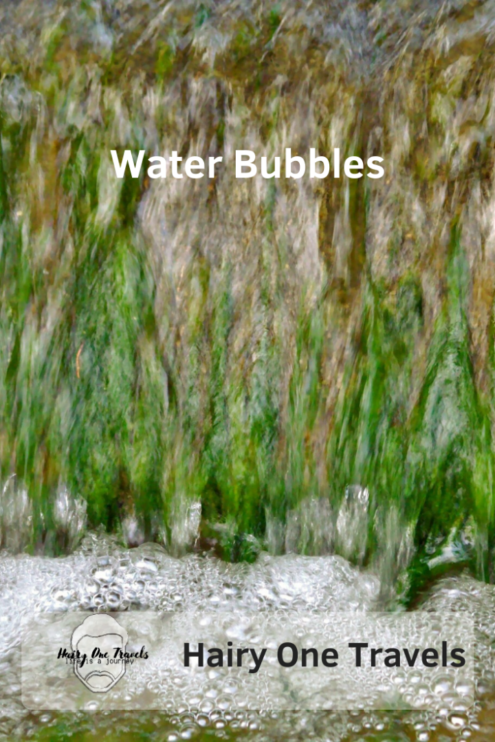 Water Bubbles at the weir at the lake