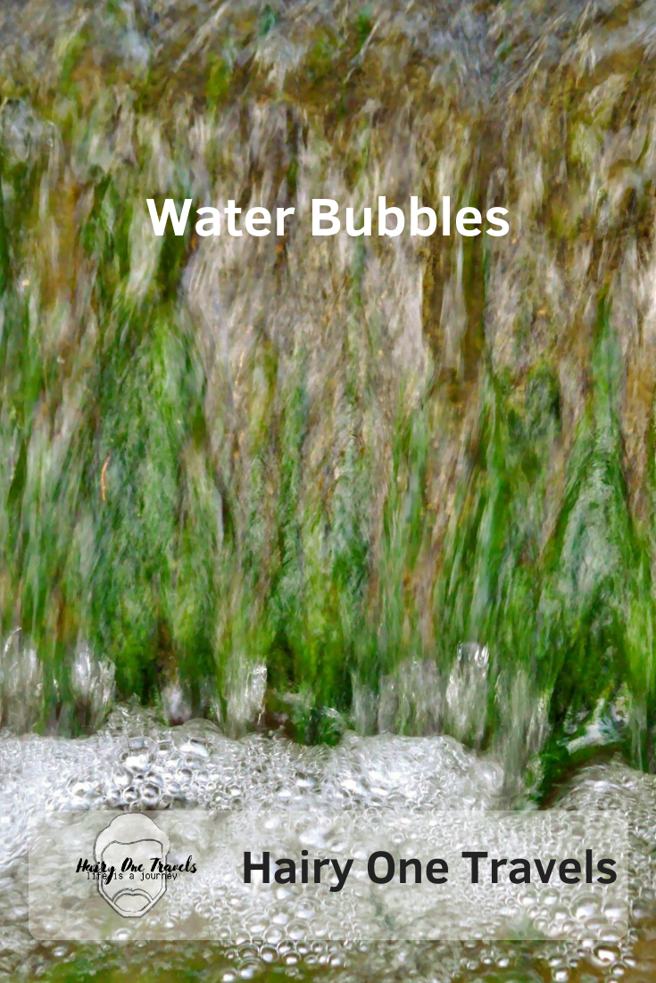 Water Bubbles at the weir at the lake