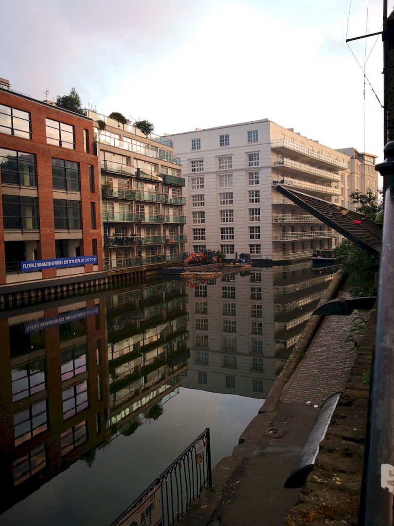 Reflection in the canal near Camden Lock in the early evening light.