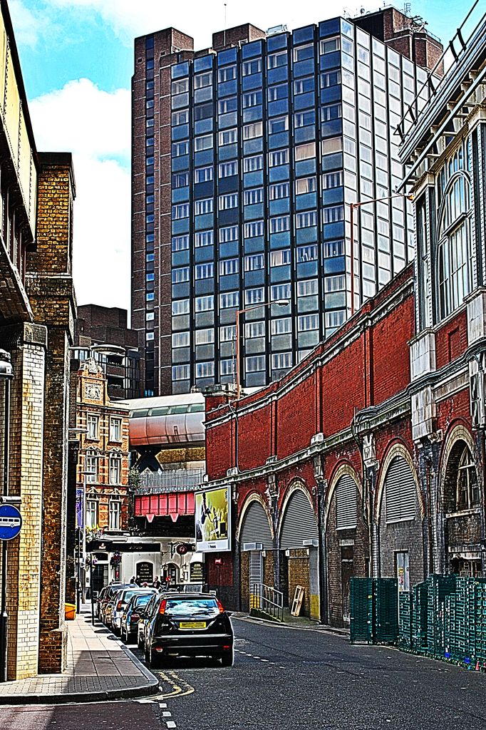 Old buildings in layers in London. The arched buildings are the back of Waterloo Station.