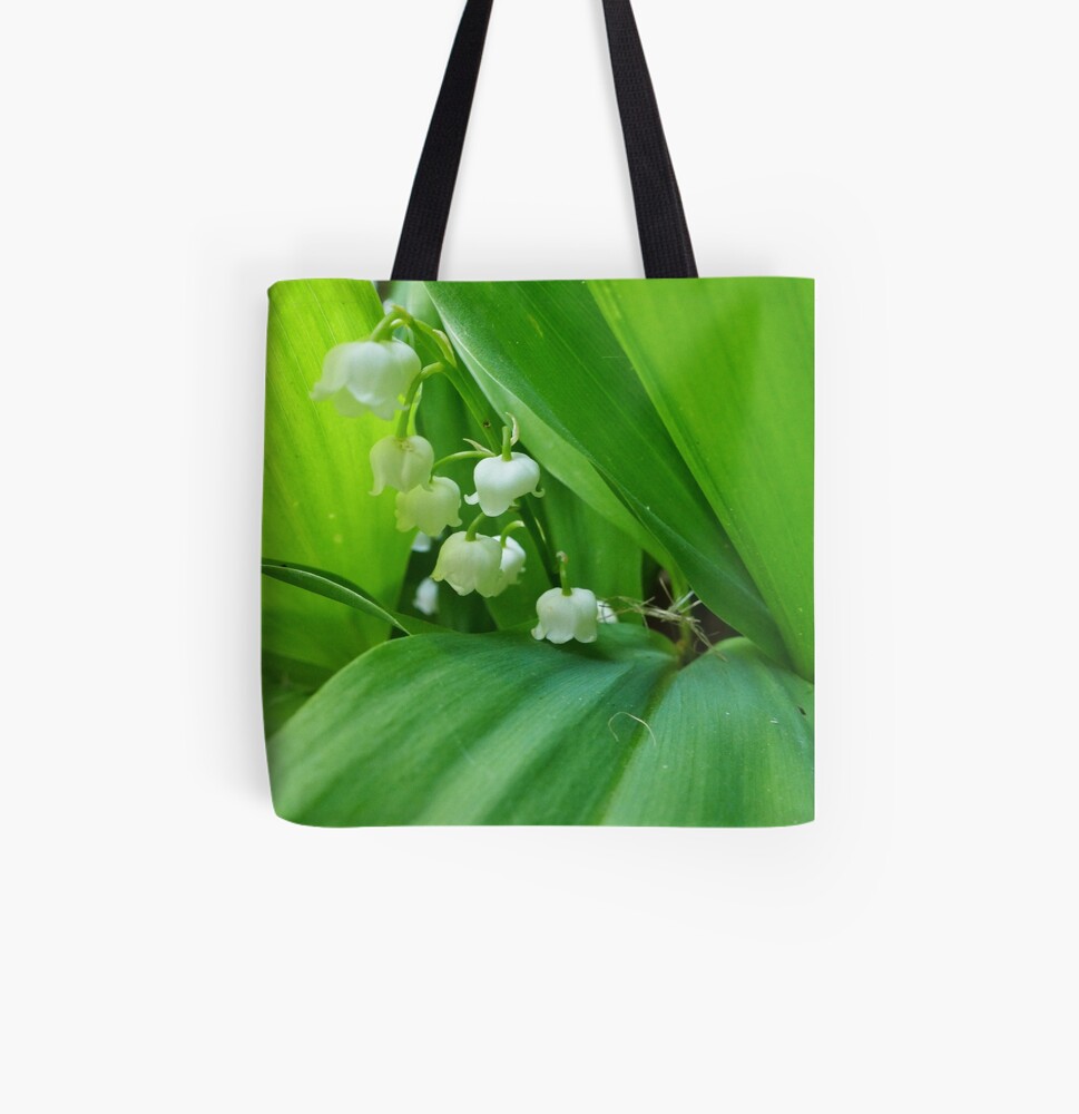 Lily of the Valley flowers tote bag available on Redbubble.