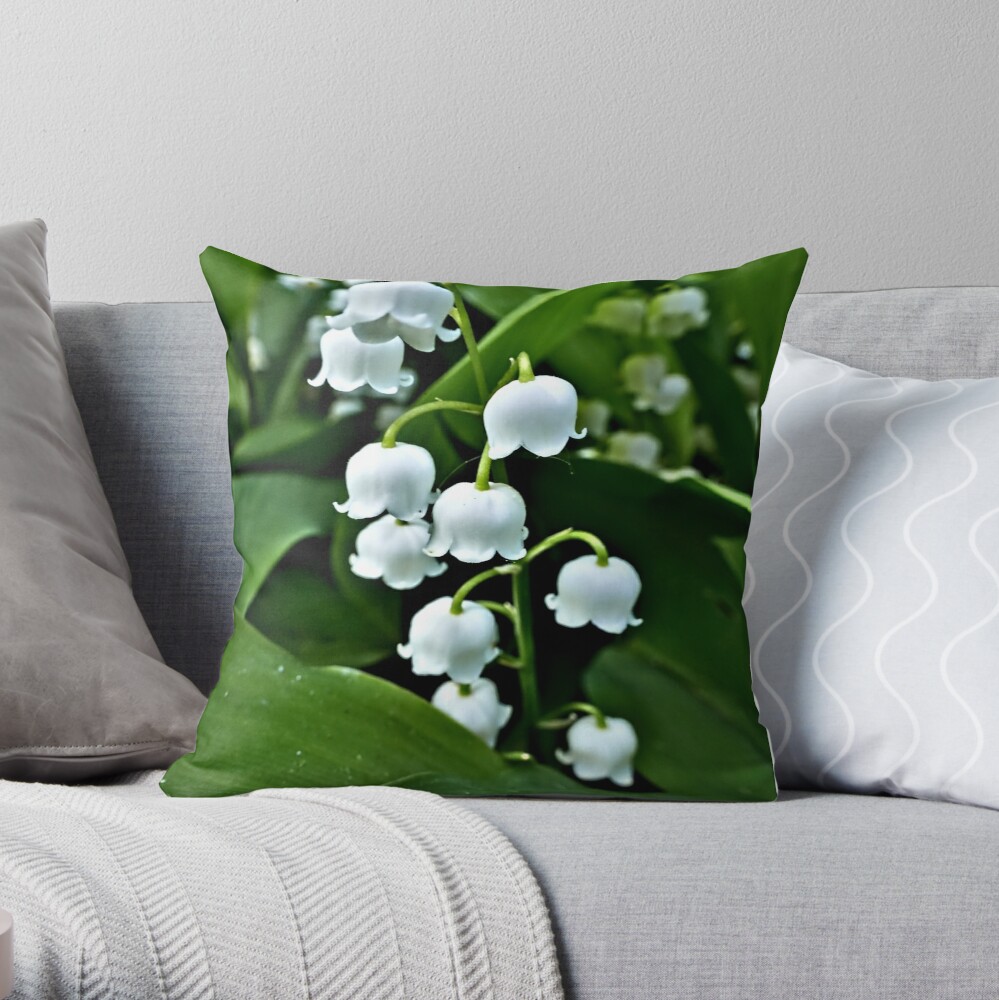 Lily of the Valley throw pillow available on Redbubble.